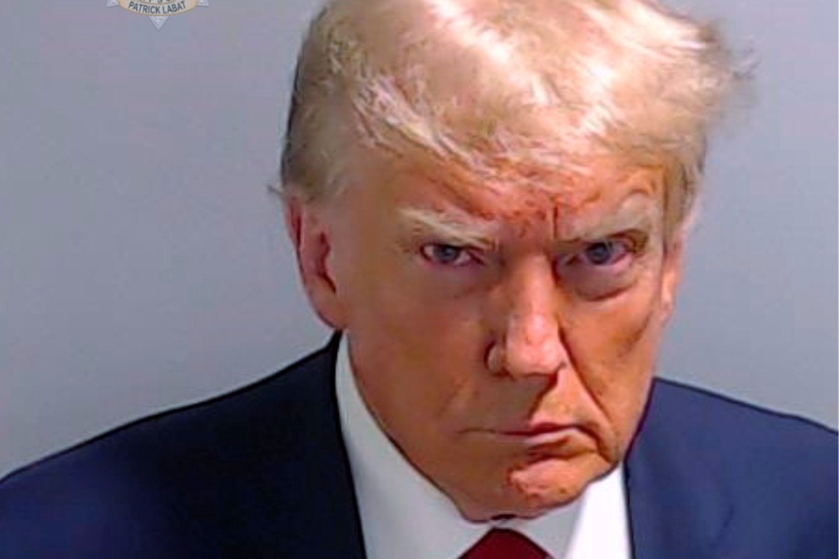 Трамп стал первым президентом США, которого сфотографировали во время ареста