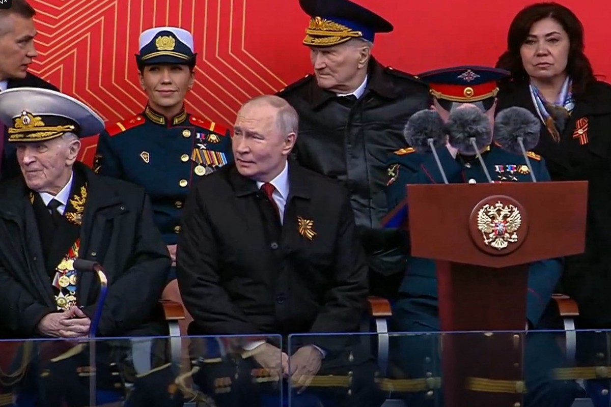 Рядом с Путиным на параде сидит ветеран, освобождавший Польшу